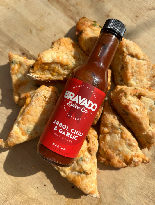 arbol chili and garlic hot sauce on spicy cheddar scones