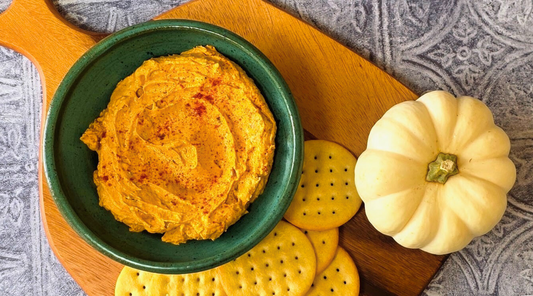 image of savory pumpkin dip with crackers made with Bravado Spice Arbol and Garlic Seasoning