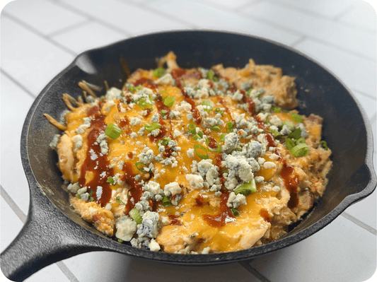 buffalo chicken dip in a skillet