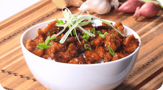 general tso's chicken in a white bowl
